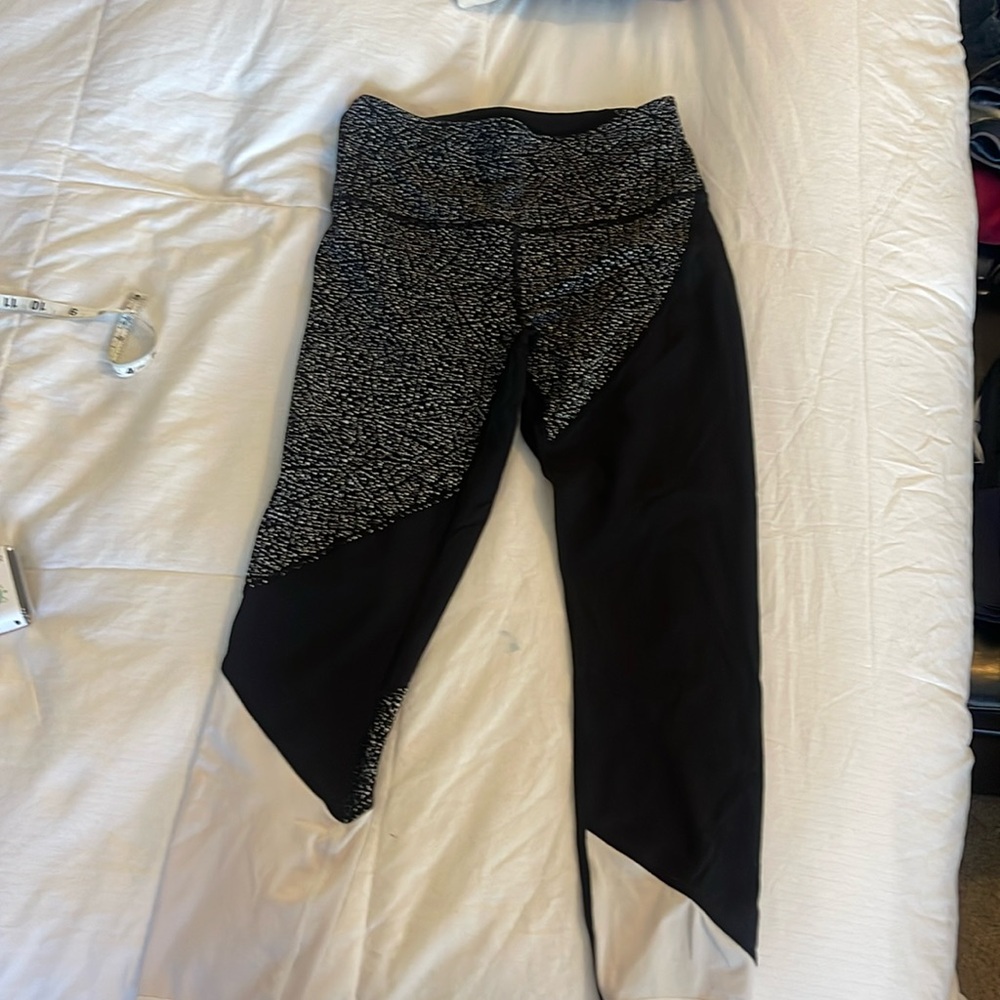 Size 8 black with design crop Lululemon leggings